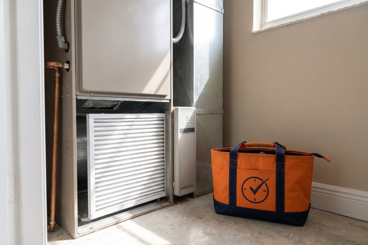 Pleated air filter slid into an air handler closet return